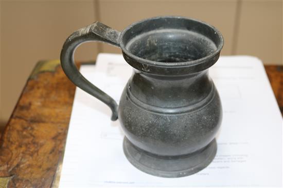 Five graduated pewter tankards, tallest 17cm